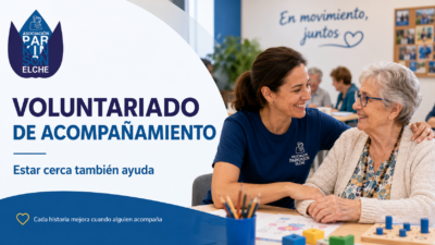 Persona voluntaria acompañando a una persona con párkinson en una actividad grupal de Parkinson Elche